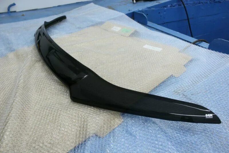 Фото. Дефлектор капота egr. Sfofo20512. Дефлектор sim storav1012. Sportage 2010- дефлектор капота.