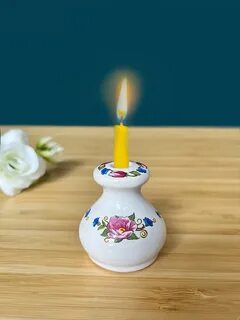 Небольшой фигурный подсвечник для несколько свечей