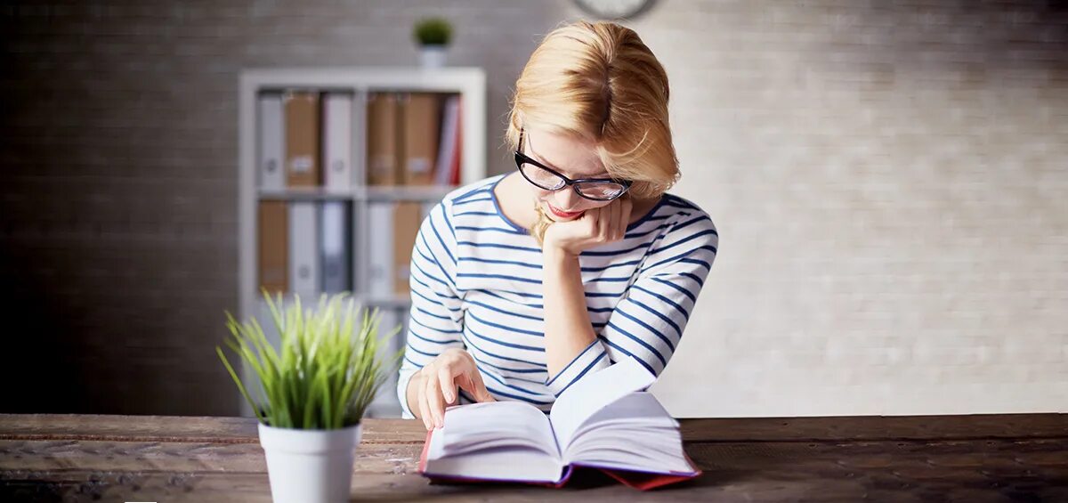 Instead of reading. She is reading. She is reading a book. Read books, they. Pictures about reading.