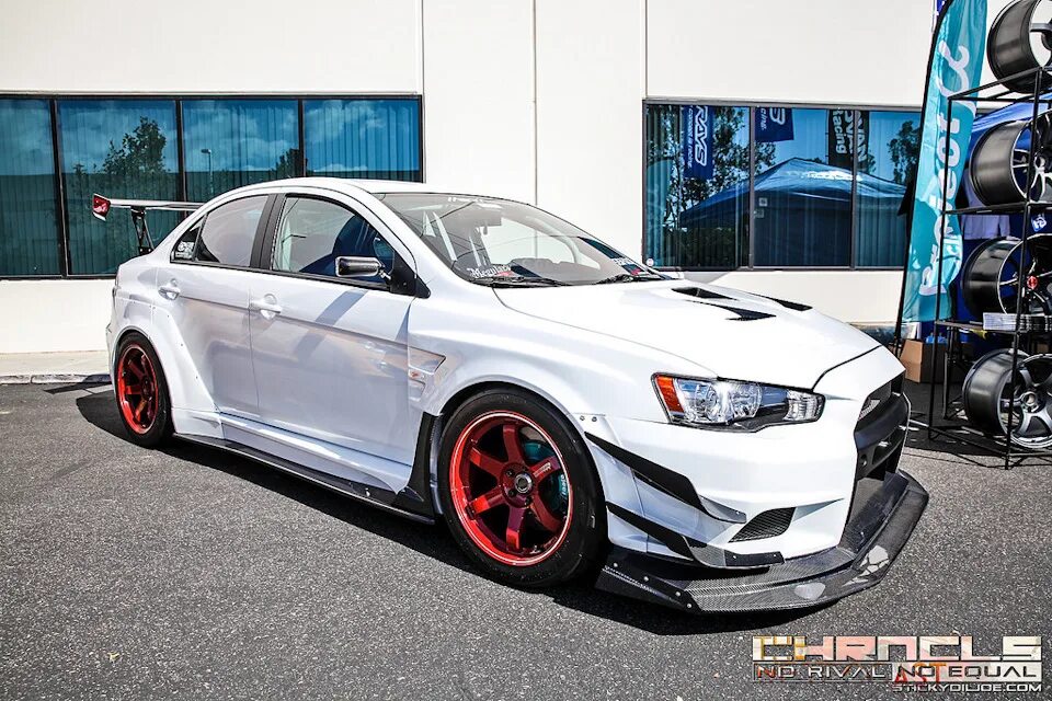 Mitsubishi evo 11 2024. Mitsubishi EVO 10 Rocket Bunny. Mitsubishi Lancer EVO 10 Rocket Bunny. Lancer 10 Rocket Bunny. Lancer Evolution 10 varis.