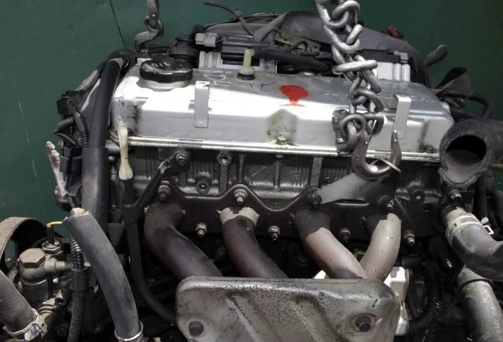 Mitsubishi 4g. Двигатель Мицубиси 2.4 g64s4m. Двигатель 4 g 64 Митсубиси. Мотор 4g64 Mitsubishi 2.4. Двигатель Митсубиси Галант 2.4 4g64.