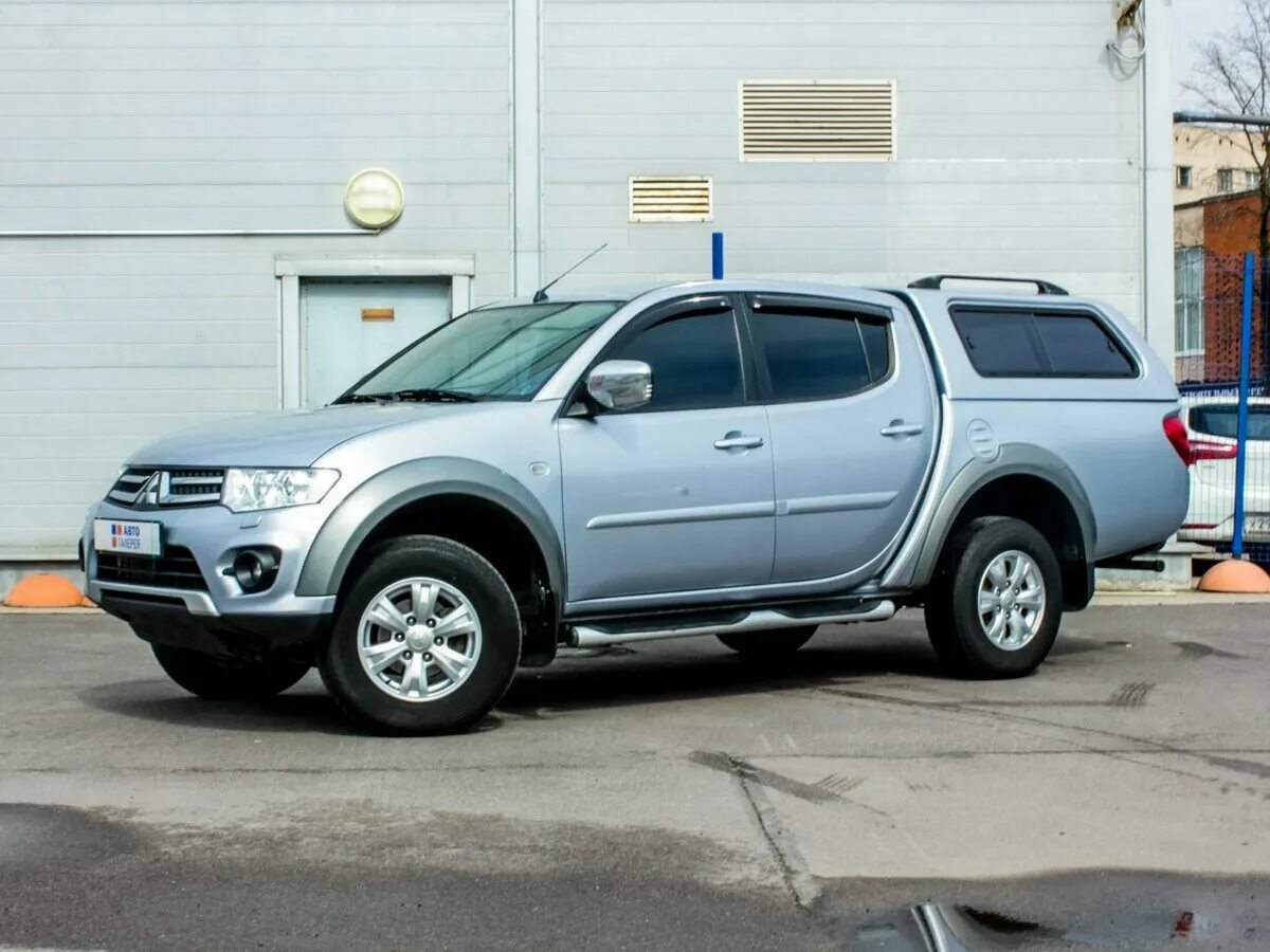 Mitsubishi l200. L 200 Mitsubishi l200. Митсубиси l200 2014. Mitsubishi Pickup l200.