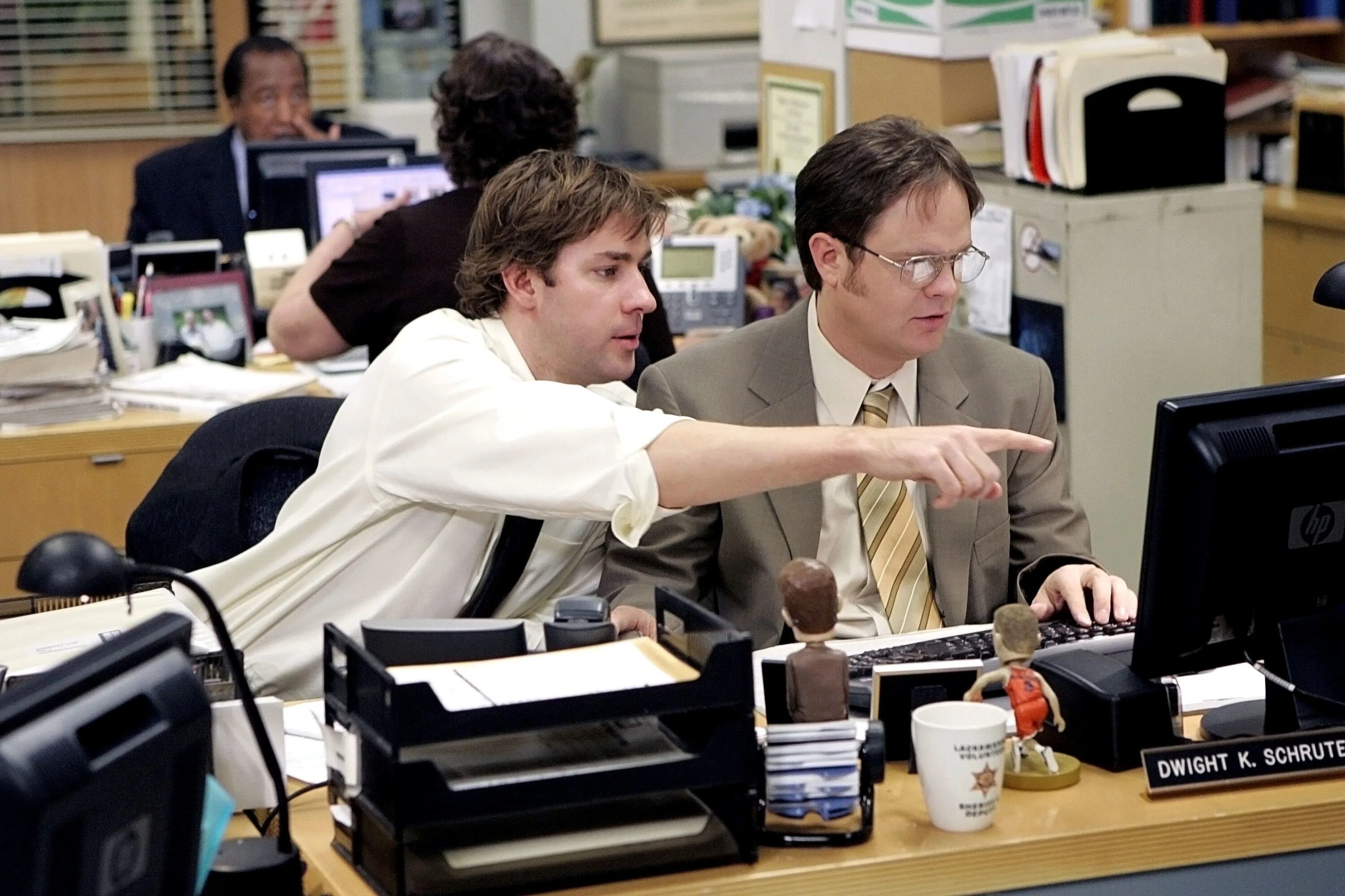 He is working in the office
