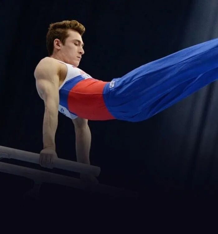 Спортивная гимнастика мужчины немов. Разновысокие брусья в спортивной гимнастике. Гимнастика. Разновысокие брусья олимпийские чемпионки. Гимнастический флажок.