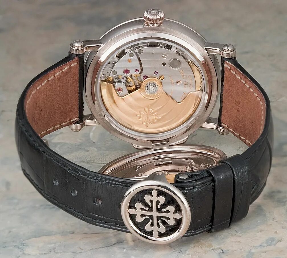 Патек филип цена оригинал. Часы Патек Филип оригинал. Patek Philippe часы Genuine Leather. Patek Philippe 5053g.