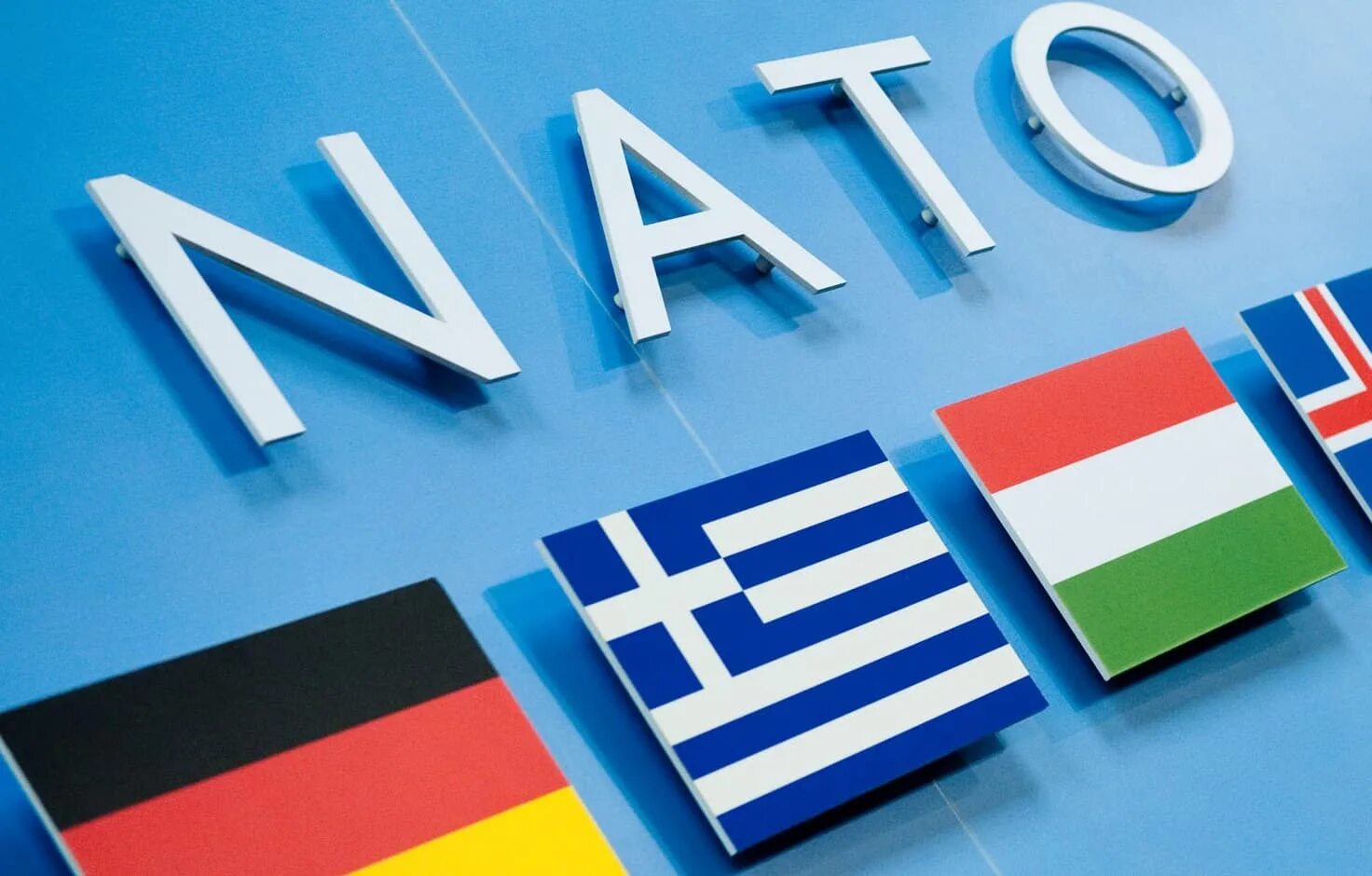 Нато тест. НАТО. Флаги стран НАТО. НАТО картинки. Эмблема НАТО.