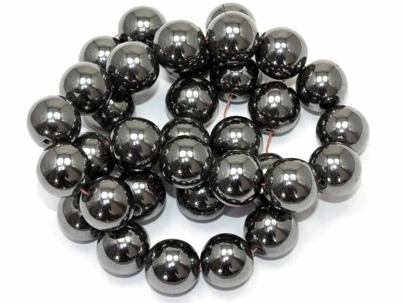 Гематит значение для человека. Кровавик-гематит камень. hematite камень. черный камень гематит. агат с гематитом.