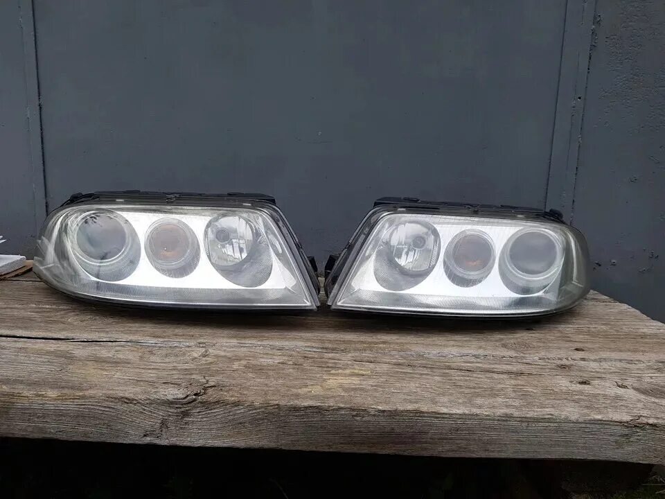 Фары фольксваген пассат б5. Passat b5 фары hella. фары hella vw passat b5. passat b5+ фары ксенон. фары hella passat b5 ксенон.
