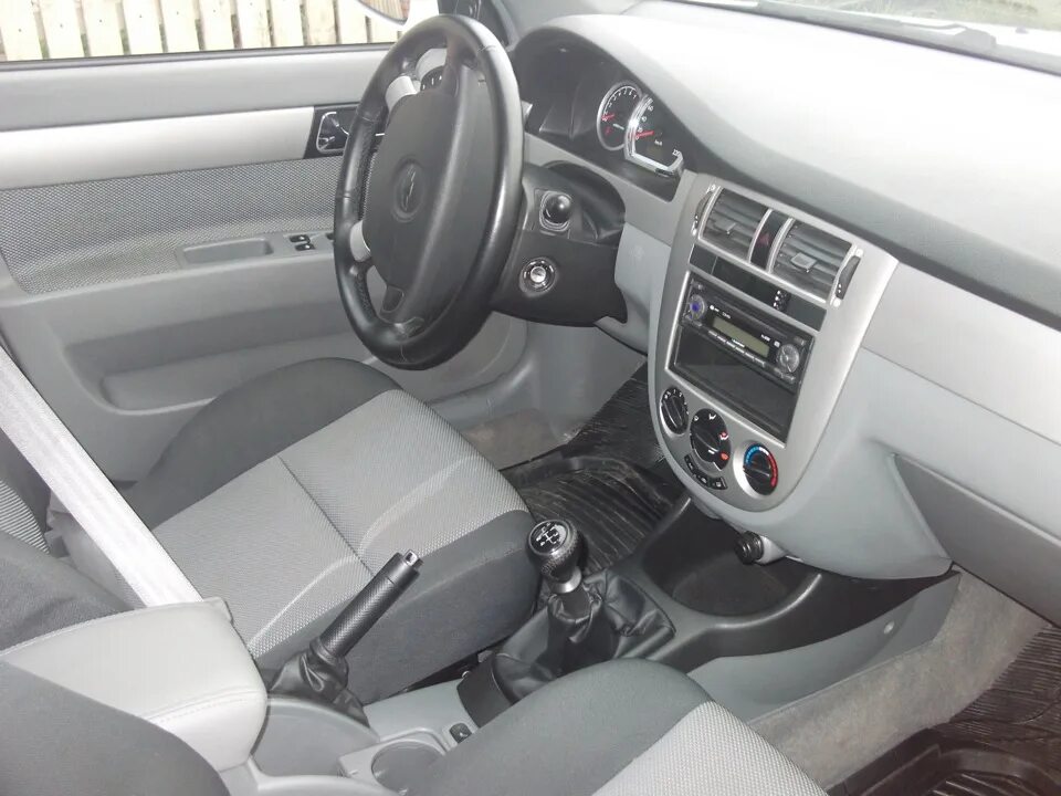 Лачетти универсал салон. Chevrolet Lacetti 2012 хэтчбек салон. Chevrolet Lacetti 2004 салон. Chevrolet Lacetti 2012 салон. Лачетти седан 1.6 салон.