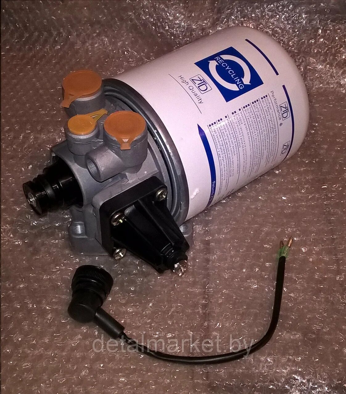 Осушитель воздуха камаз 24v wabco 4324101400. Влагоотделитель фредлайнер. Осушитель камаз с рдв 4324101027. Влагоотделитель в сборе. Влагоотделитель в сборе.