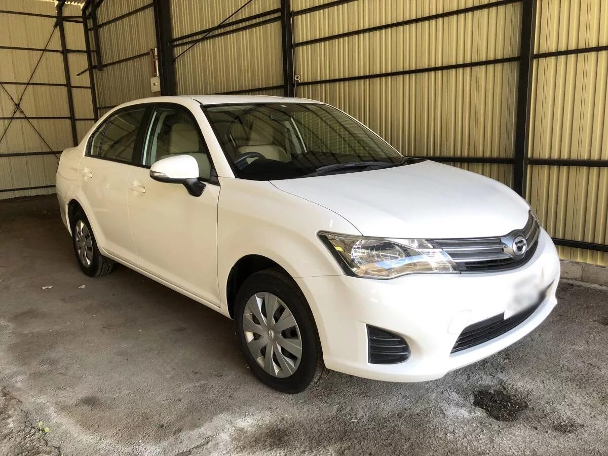 Продаже тойота аксио. Toyota Corolla Axio 2014. Toyota Axio 2014. Toyota Axio 4wd. Toyota Axio 2014 nze161.