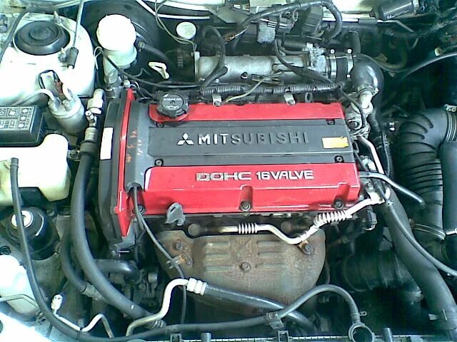 Двигателе dohc 4. 4g93 dohc. двигатель митсубиси 4g92 mivec. mitsubishi dohc 16 valve двигатель. двигатель dohc 16 от митсубиси.