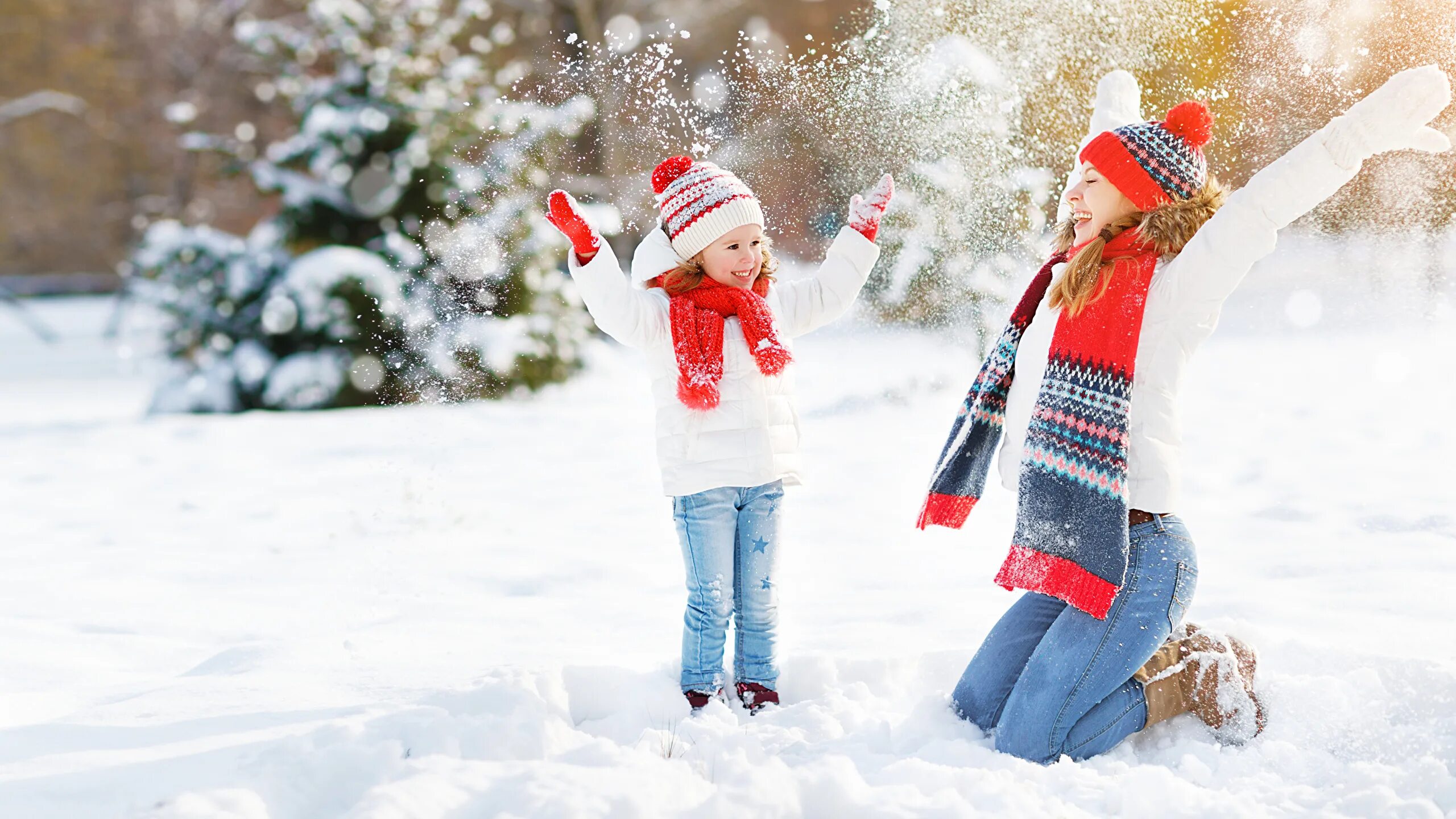 Child playing in the snow