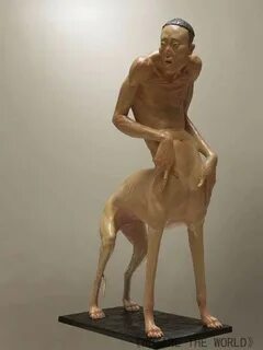Мальчик с головой собаки