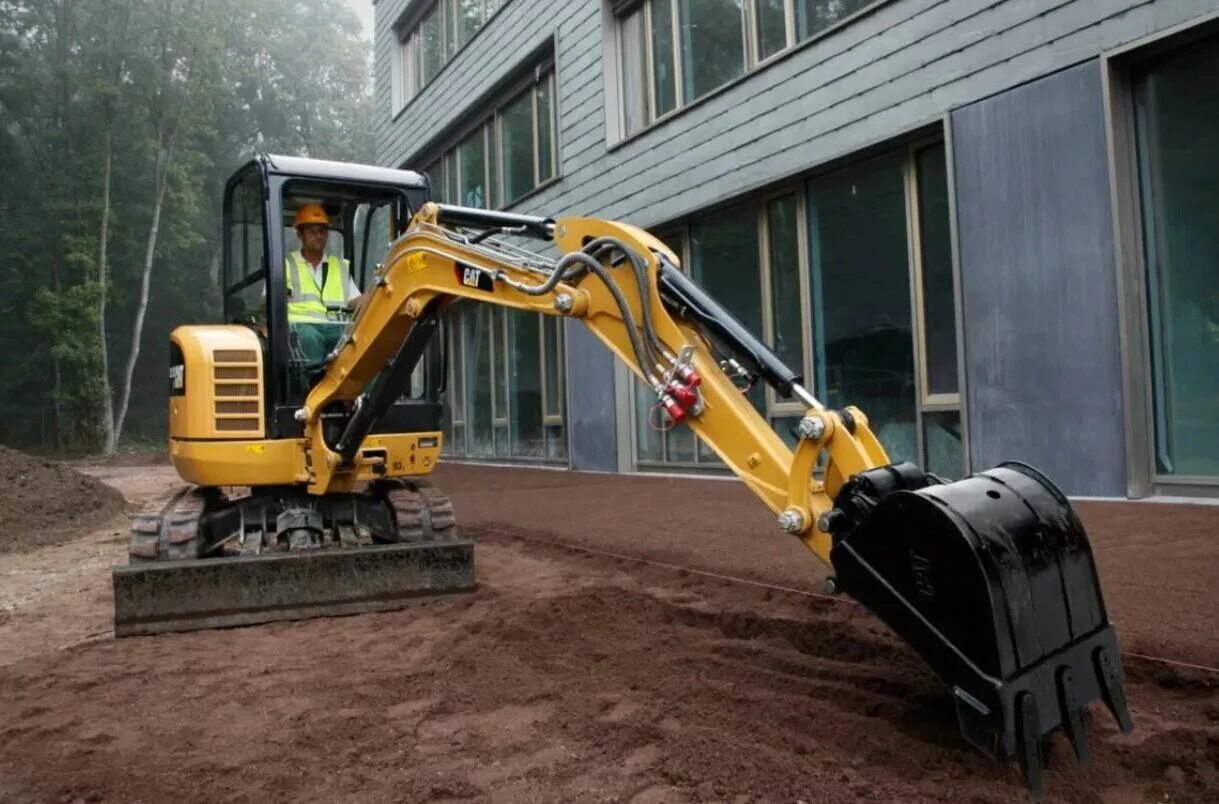 Авито москва экскаватор. Мини экскаватор Caterpillar. Траншейный мини экскаватор Катерпиллер. ДСБ г8030 кабина экскаватор мини. Мини экскаватор погрузчик Катерпиллер.