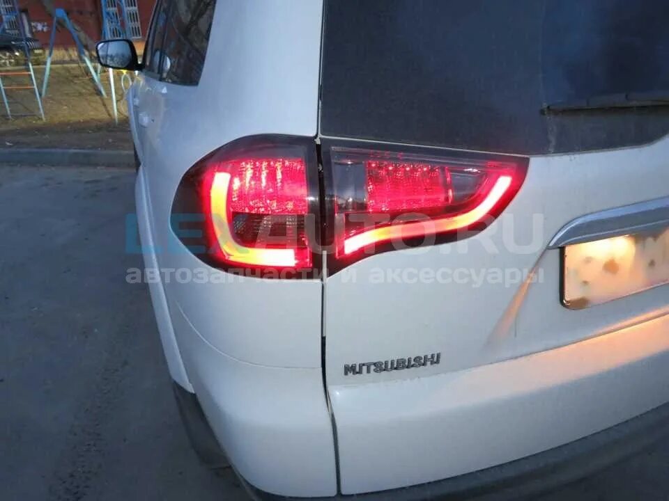 Задние фонари паджеро спорт. Задние фонари pajero sport 2. mitsubishi pajero sport 2 задние фонари. задние диодные фонари mitsubishi pajero 2. задние диодные фонари паджеро спорт 2.