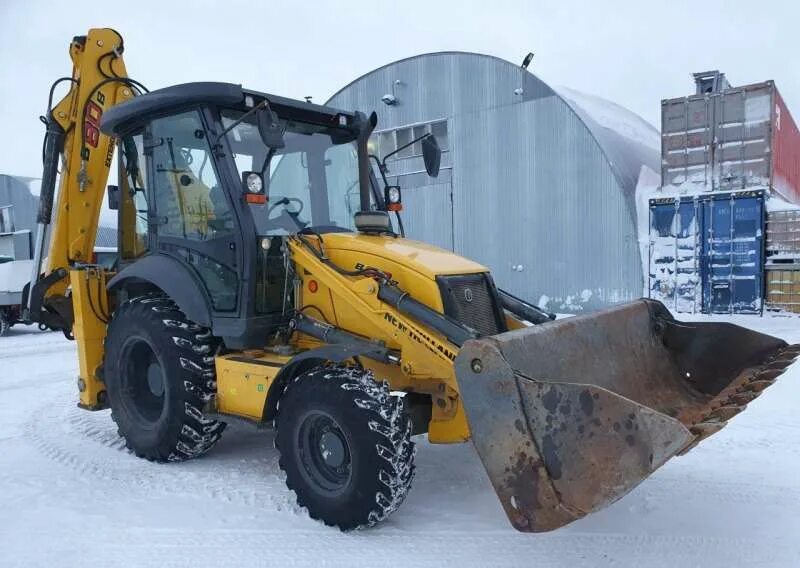 Экскаватор сургуте. New Holland b80b. Экскаватор-погрузчик Volvo bl61b. New Holland экскаватор погрузчик и80и. Трактор New Holland b80b.