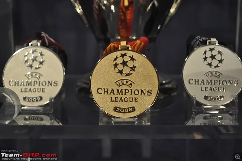 Награды ома. Бронзовые медали АПЛ. Медаль Лиги чемпионов. Золотая медаль Лиги чемпионов. Медаль Лиги чемпионов УЕФА.