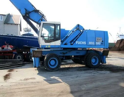 Перегружатели fuchs. Перегружатель фукс 380. fuchs mhl 380. terex fuchs mhl 380. fuchs mhl 340.