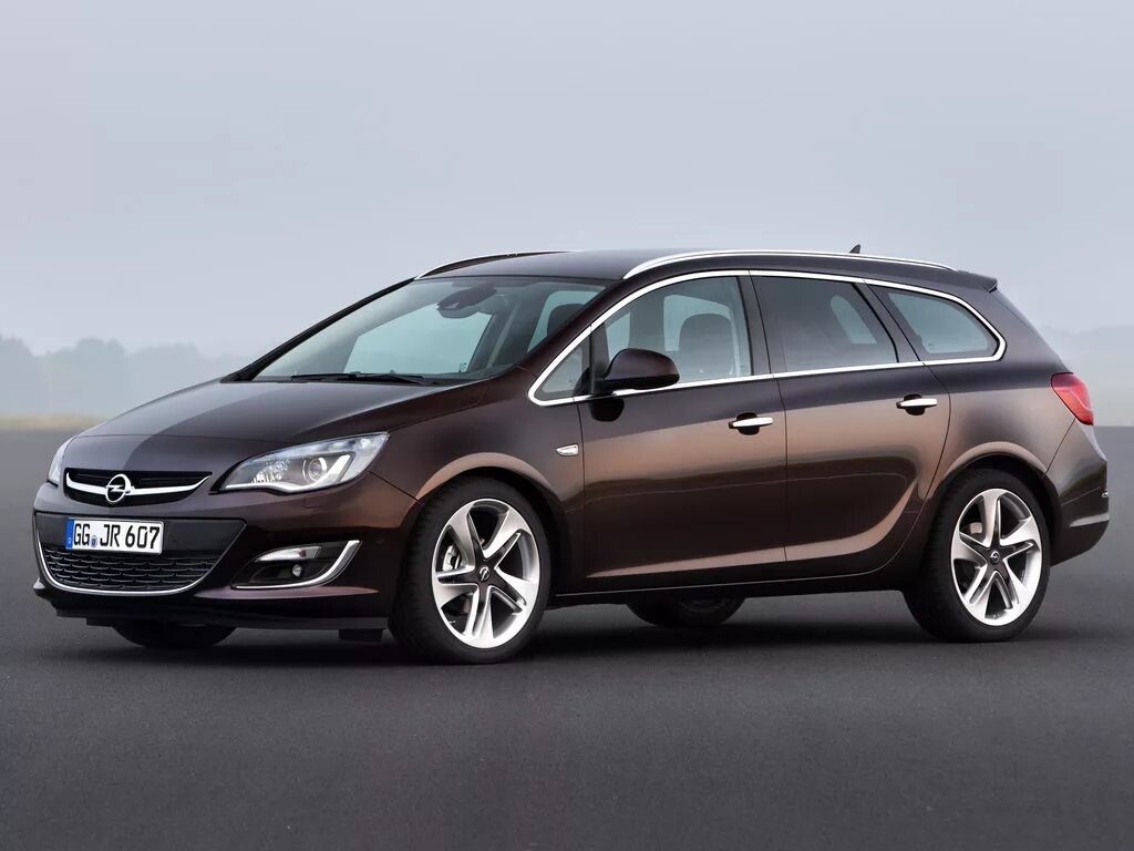 Опель сколько лошадей. Opel Astra Sports Tourer 2012. Opel Astra Sports Tourer 2015. Opel Astra j Sports Tourer.