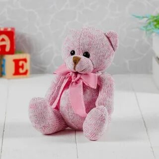 Игрушка розового цвета