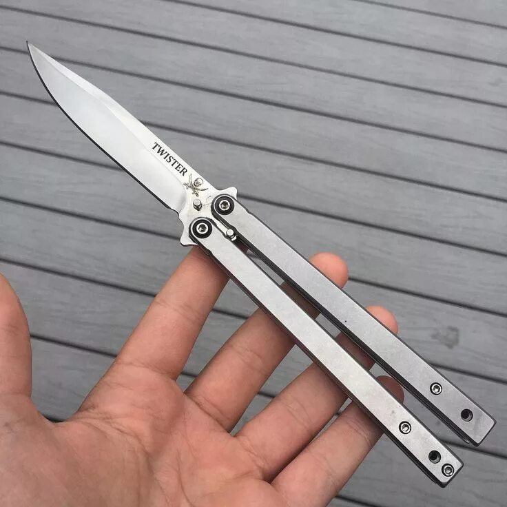 Нож бабочка балисонг. Складной нож балисонг benchmade. бабочка балисонг.