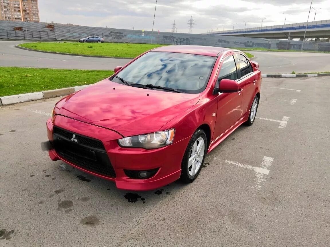 Мицубиси 10 года. Mitsubishi Lancer 10 2008. Митсубиси Lancer 2008. Митсубиси Лансер 10. Митсубиси Лансер красный 2008.