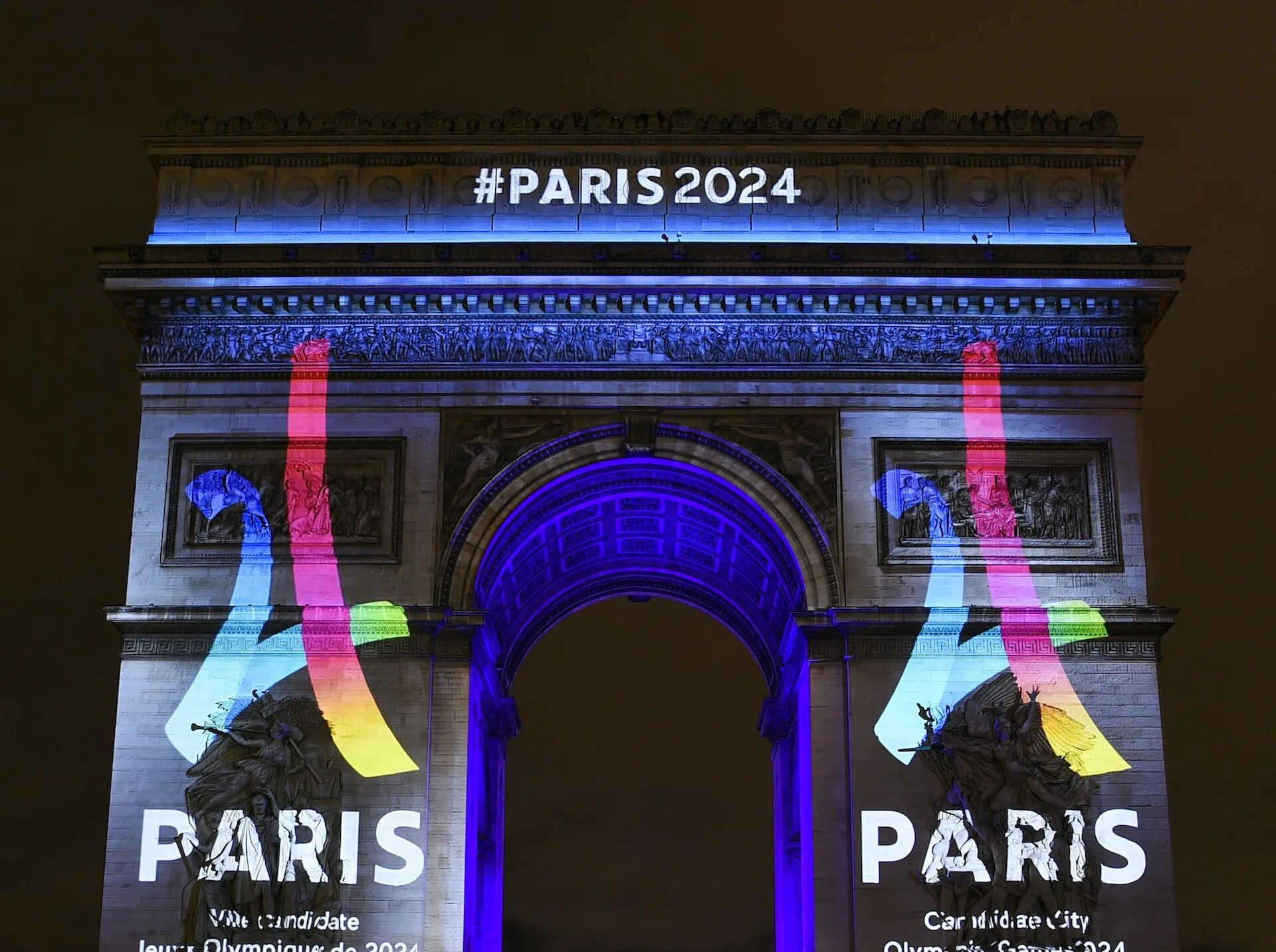 The year is 2024. Париж 2024. Олимпийские игры в Париже 2024. Эмблема Олимпийских игр в Париже 2024.