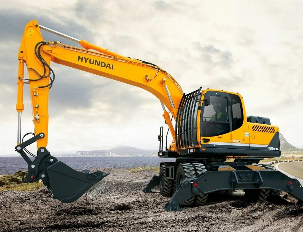 Экскаватор Hyundai r180w-9s. Колесный экскаватор Hyundai r180w-9s. Экскаватор Hyundai 180 9s. Hyundai 180w-9s. Аренда колесного полноповоротного экскаватора