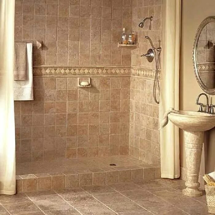 Какая плитка лучше для комнаты. Ванная из плитки. Кафельная плитка для ванной комнаты. Плитка в душевой. Плитка ракушечник для ванной.