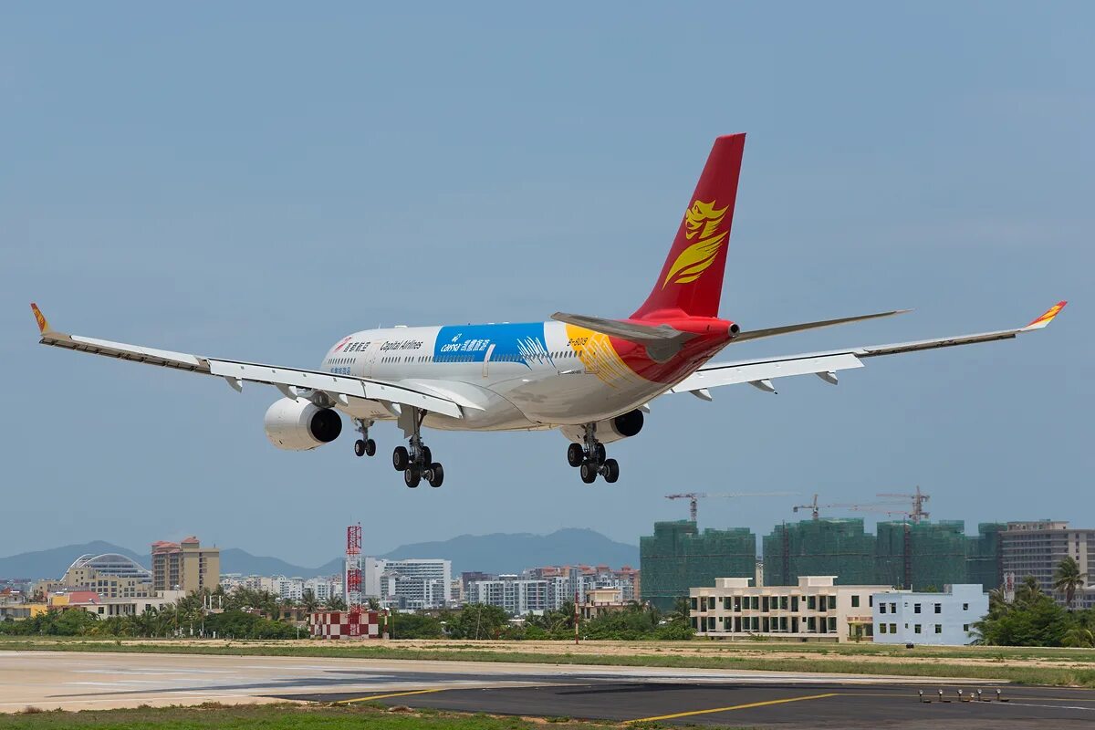 Аэропорт хайнань китай. Аэропорт Феникс Хайнань. Sanya Phoenix International Airport a330. Хайнань Санья аэропорт Феникс. Hainan Airlines Airbus a330.