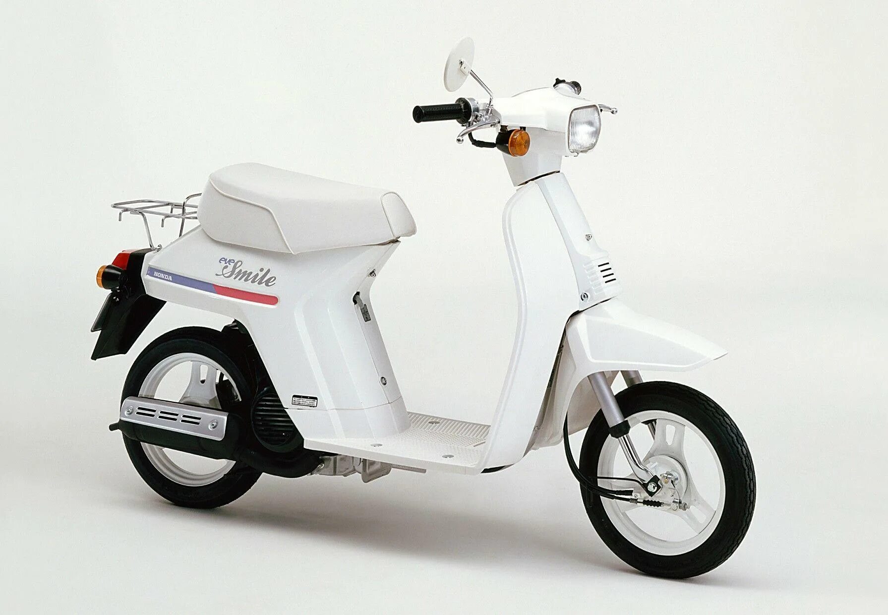 Honda eva. Скутер honda eve smile. Honda pax af-14. Honda eve 1984. Мопед honda eve.