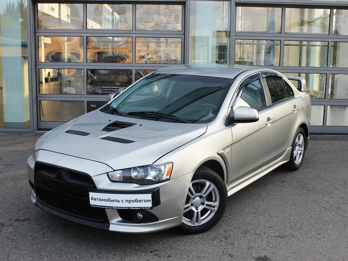 Mitsubishi lancer выпуска. Митсубиши Лансер 10. Mitsubishi Lancer x 10. Mitsubishi Lancer x 2008г. Mitsubishi Lancer x Рестайлинг 2013.