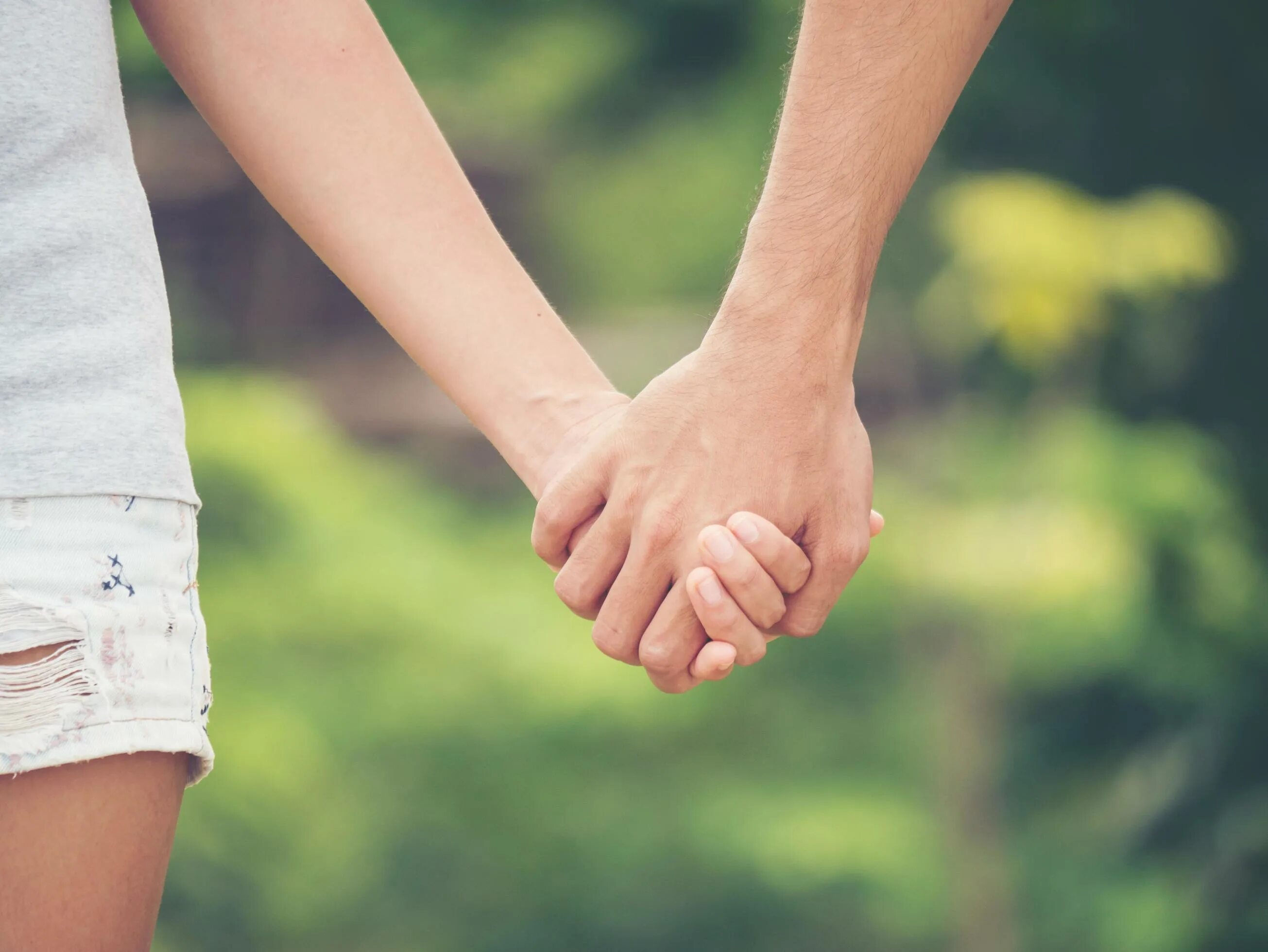 Hands holding together