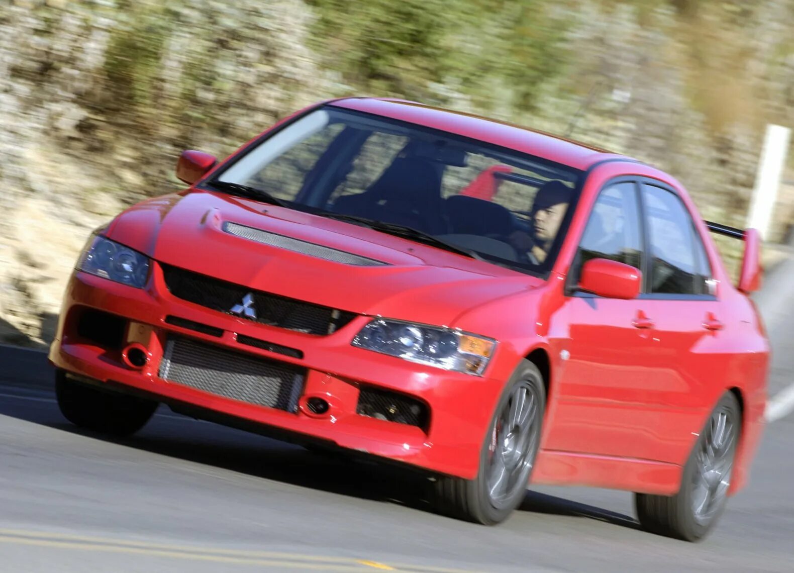 Evo tl. Митсубиси Лансер Эволюшн. Mitsubishi Lancer EVO 2007. Митсубиси Эволюшн 9. 2006 Mitsubishi Lancer Evolution IX Mr.