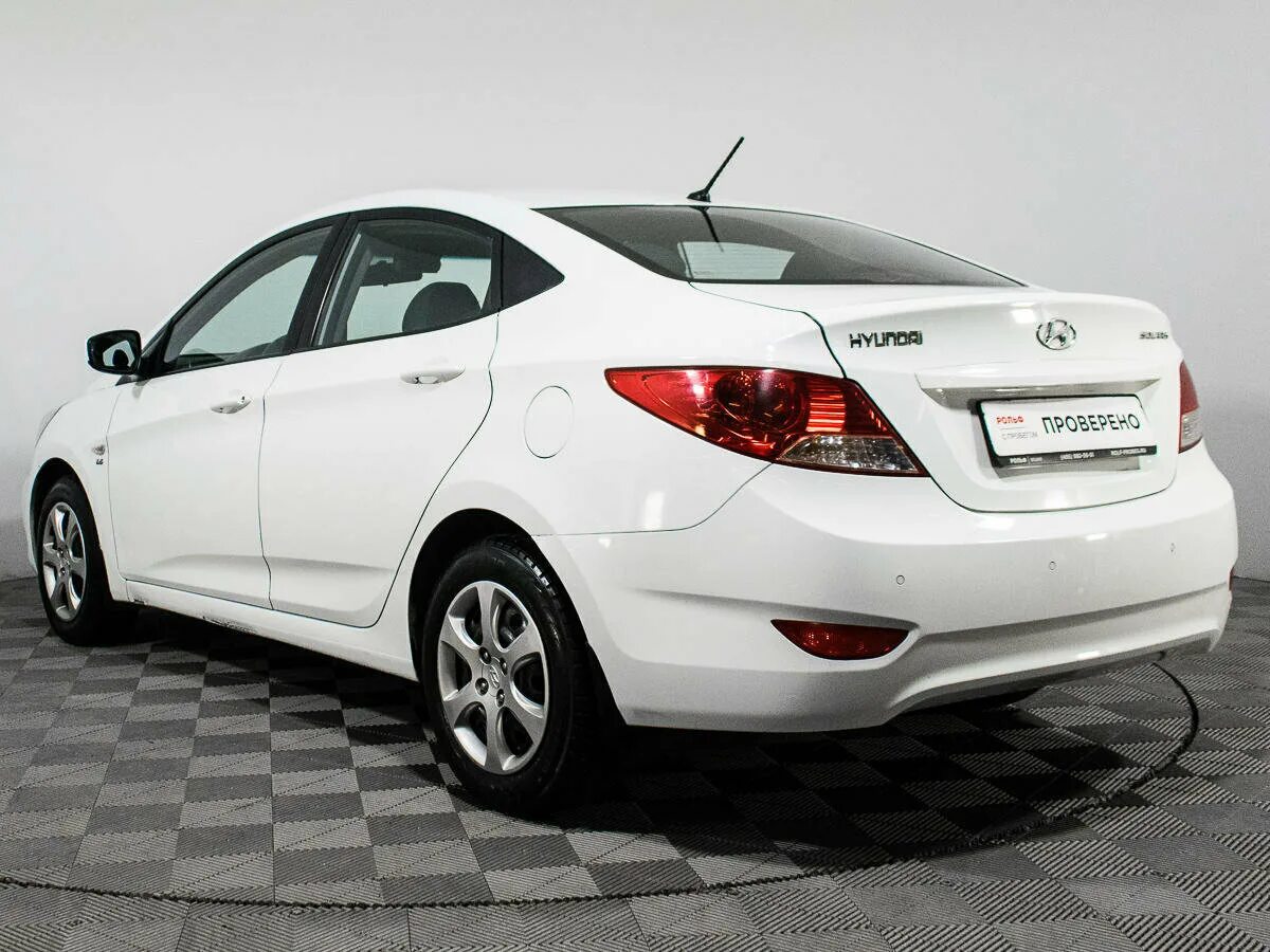 Купить солярис в петербурге. Hyundai Solaris 2015 1.4 at белый седан. Хендай Солярис 1 белый. Hyundai Solaris 1 Рестайлинг белый. Хендай Солярис 1 Рестайлинг белый.