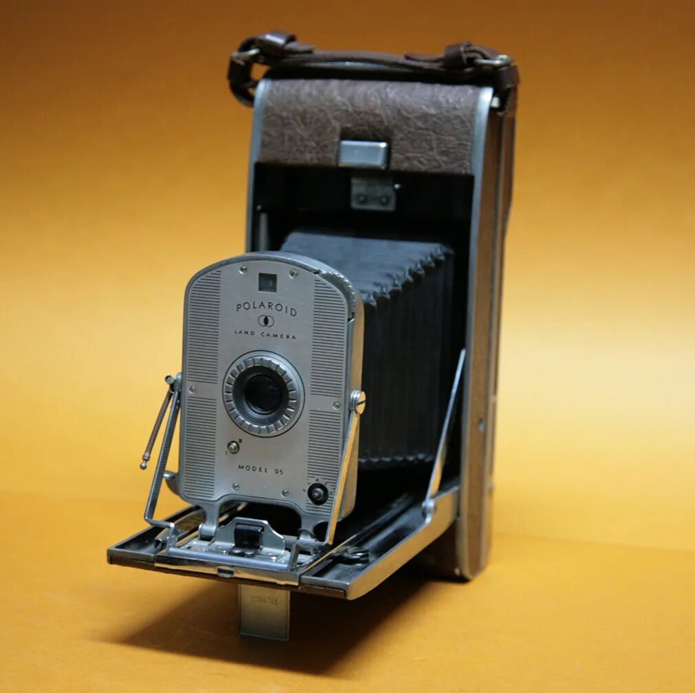 Polaroid camera mod. Фотоаппарат polaroid land 95. polaroid land 95. камера. полароид ленд камера модель 95. полароид 1948.