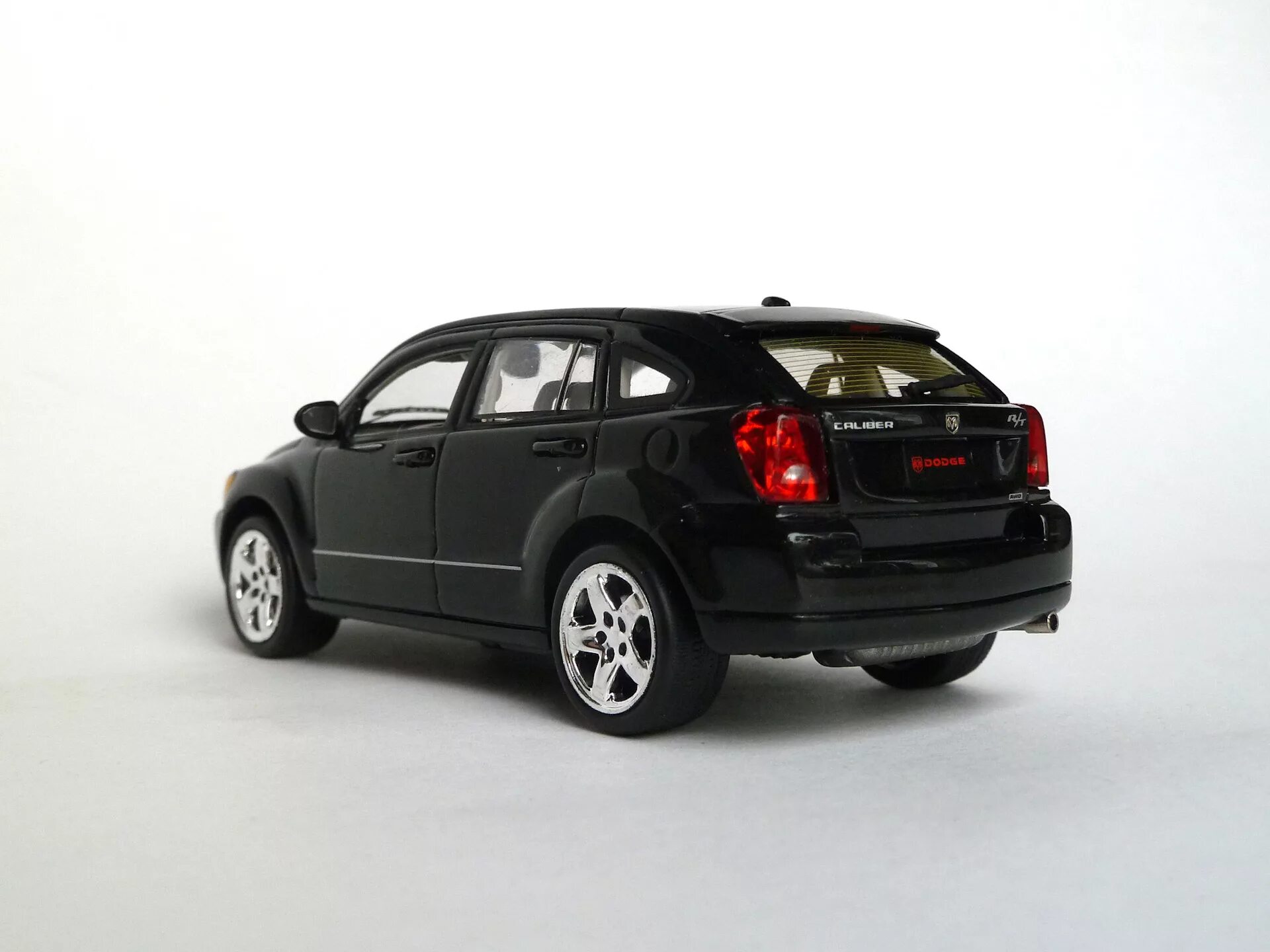 Dodge caliber купить. Dodge Caliber 2021. Модель Додж Калибр 1:18. Dodge Caliber 2020. Dodge Caliber модель 1/34.