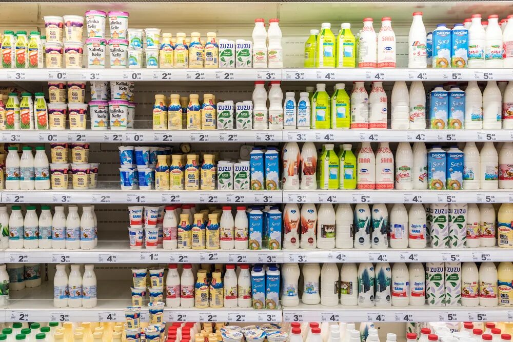 Milk is on the upper shelf