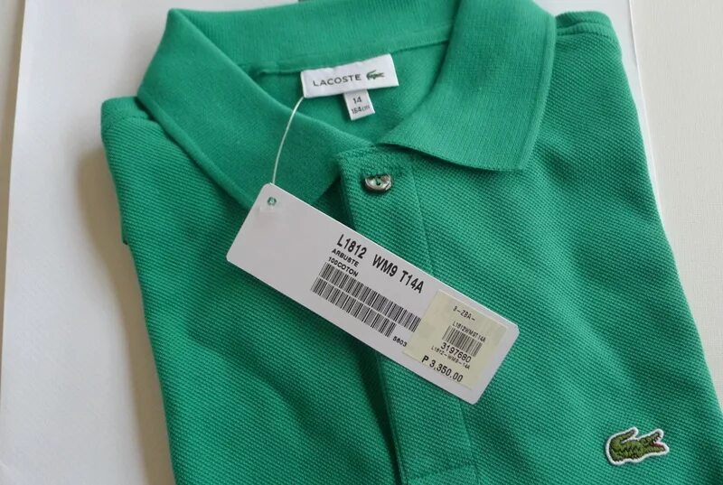 Бирки рубашки. Оригинальная бирка Lacoste. Lacoste одежда. Поло лакост бирки. Бирка на рубашке.