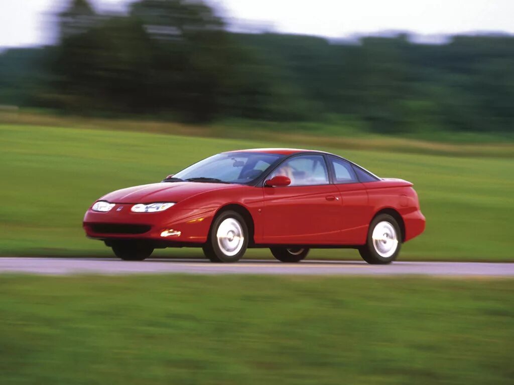 Saturn sc. Автомобиль сатурн sc2001г. saturn sc, 1998. saturn s series coupe. сатурн машина американец.