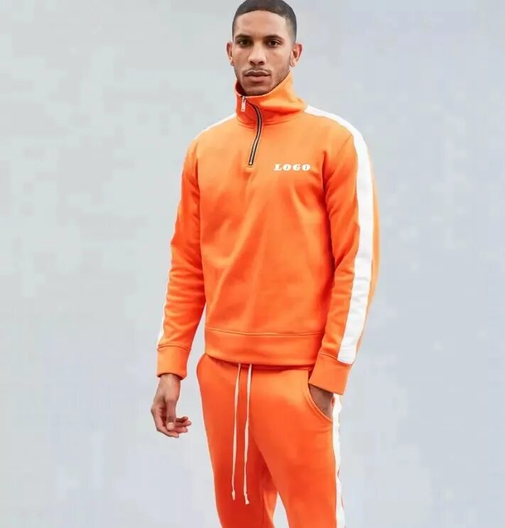 Оранжевый спортивный костюм мужской. Мужской спортивный костюм оранжевого цвета. Оранжевый костюм adidas.