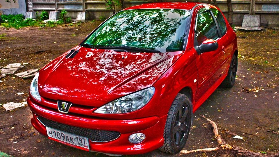 Пежо 206 стоп. Peugeot 206. Пежо 206 красный. Пежо 206 седан красный. Peugeot 206 1.4.