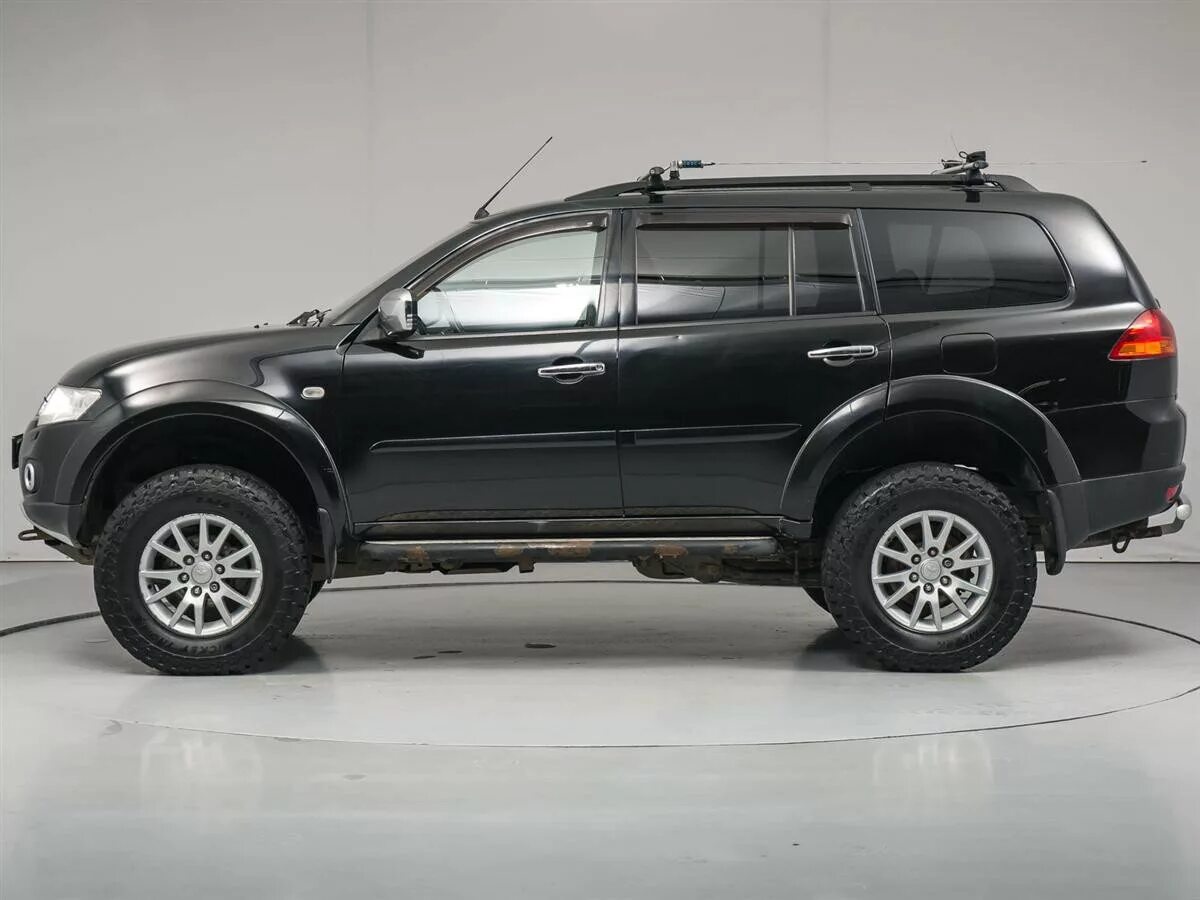 паджеро спорт 2 2008. паджеро спорт 2 отзывы. машину митсубиси джип черного цвета. паджеро спорт 2012. Mitsubishi чёрная внедарожник.