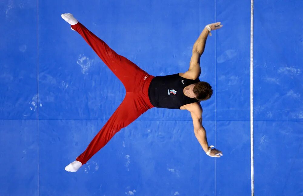 Алексей немов афины 2004. Алексей немов гимнаст. Алексей немов олимпийский чемпион. Гимнаст россии алексей немов. Специализация немова.