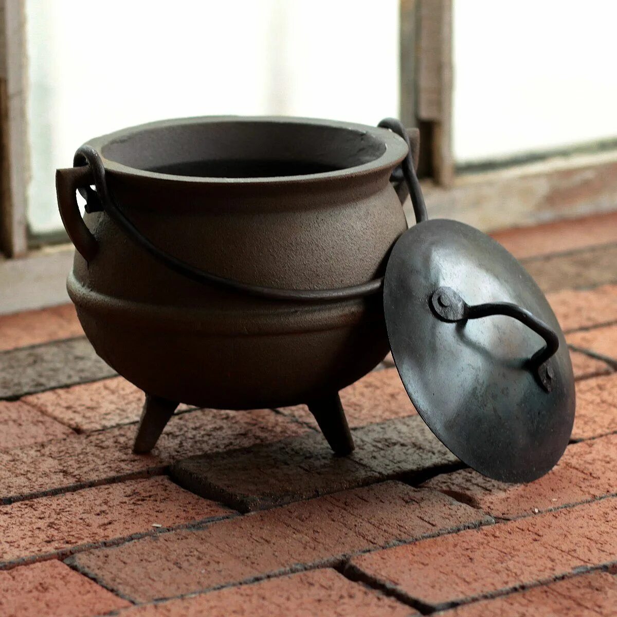 Cast Iron Pot. Cast Iron Cauldron trade House. Zhangqiu Iron Pot. A Fire Burning in an Iron Pot.