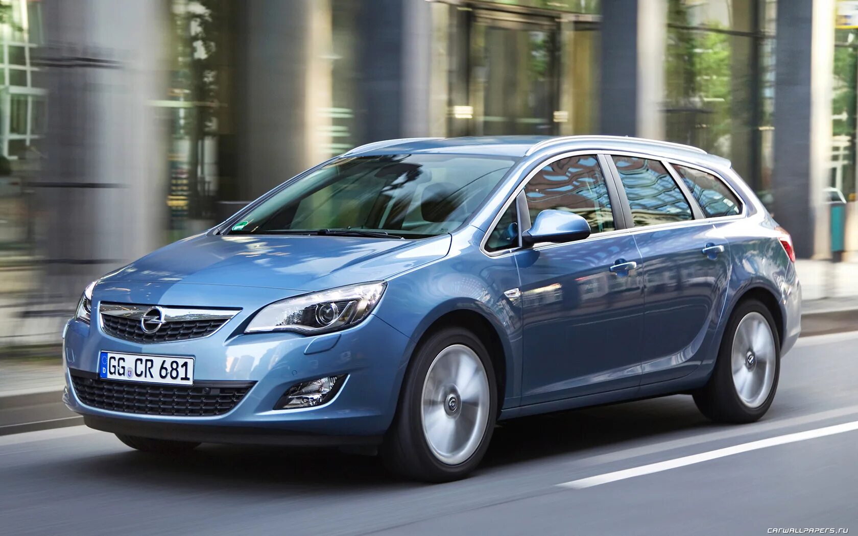 Opel Astra Sports Tourer 2012. Opel Astra j универсал. Opel Astra 2011.