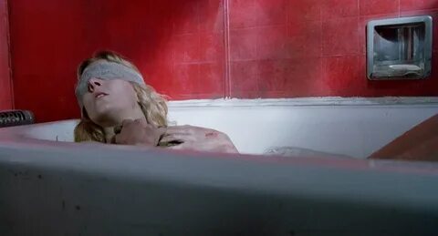 Fully naked Natasha Richardson is laying on the bathtub with her eyes cover...