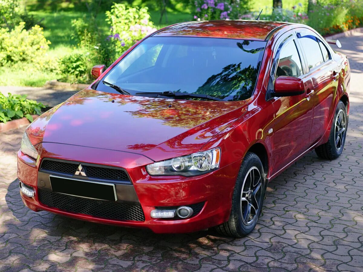 Сколько стоит ланцер. Mitsubishi Lancer 1.5 2008. Mitsubishi Lancer 2008. Митсубиси Лансер красный 2010. Mitsubishi Lancer 1.5 МТ, 2008.