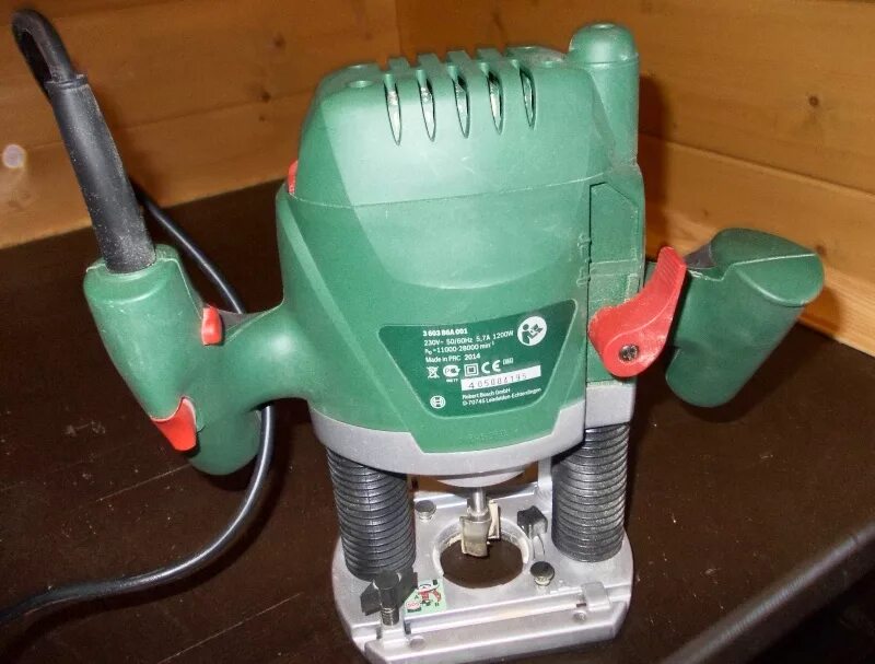 Стол для фрезера бош 1200. Фрезер bosch pof1200 ae. Фрезер бош 1200 ае. Bosch pof 1200 ae. Фрезер pof 1200 ae без подошвы фото.